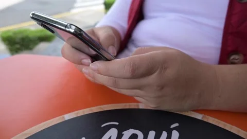 Close-up of woman's hands texting with mobile cell phone Video stock 155415817