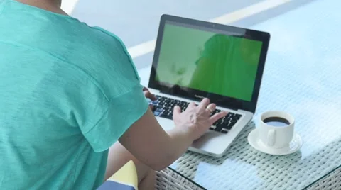 Close up of woman's hands typing on a laptop computer outdoors. 動画素材 51191661