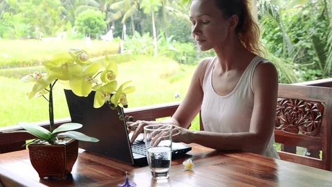 Close up of woman's hands typing on laptop outdoors. Working with computer Stock Footage 73562575
