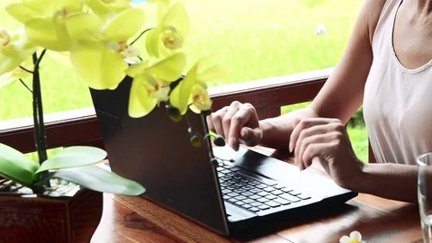 Close up of woman's hands typing on laptop outdoors. Working with computer Stock Footage 73562663