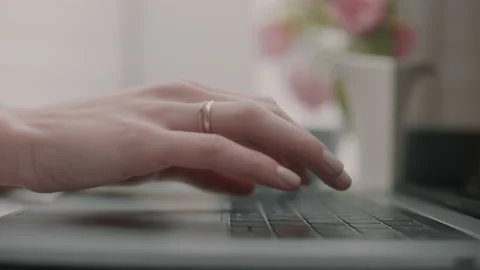 Close up of woman's hands typing on laptop Stock Footage 131048515
