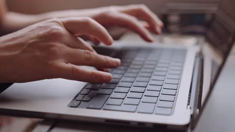 Close-up of Womans Hands Typing on a Laptop While Going by Train Stock Footage 202329383