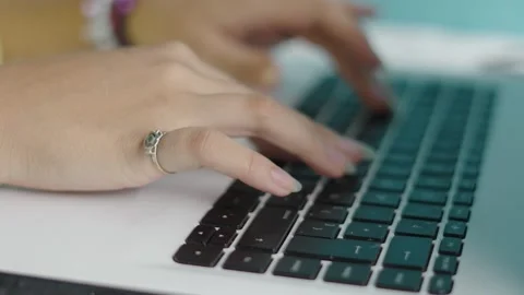 Close-Up of Woman's Hands Typing on Laptop Stock Footage 283401271