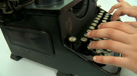 Close-up of woman's hands typing a text on an old typewriter ribbon. Stock Footage 23667943