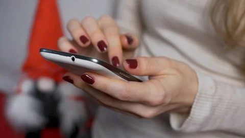 Close-up of the woman's hands using a smartphone cell phone mobile, Internet, so Stock Footage 121878878