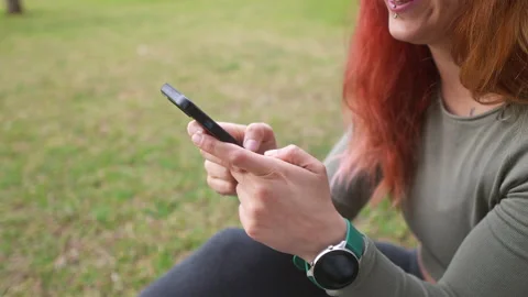 Close-up of a woman's hands using a smartphone Stock Footage 264880418