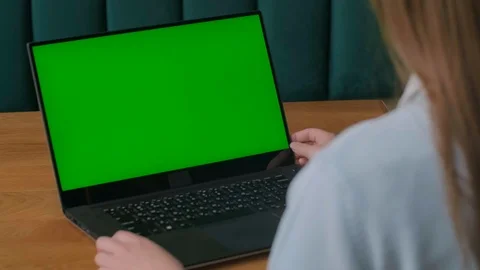 Close-up of a woman's Hands Working on Green Screen on a Laptop. 4k shot. Stock Footage 108086756
