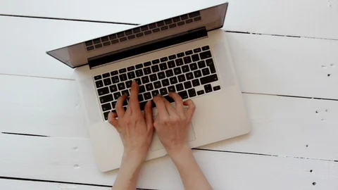 Close-up of a woman's Hands Working on a Laptop. Stock Footage 129294005