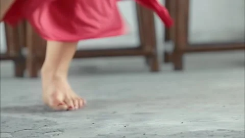 Close up of woman's legs dancing red dress and nails Video stock 278314851