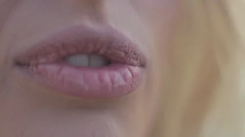 Close-up of woman's lips Stock Footage 64706162