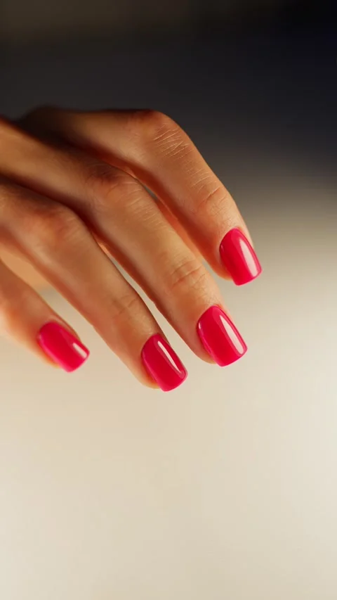 Close-up of a womans pink manicure. Stock Footage 313533561