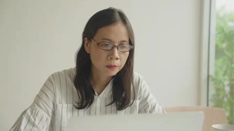 Close-up of women asian using work on computer workplace. Business Stock Footage 311560312