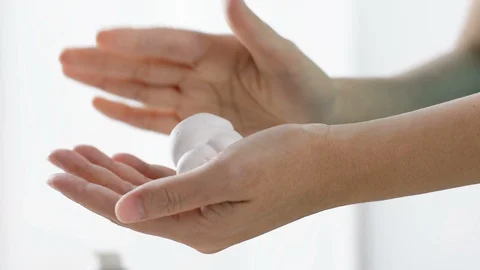 Close up of women hand using hand cream foam treatment . Stock Footage 128446371