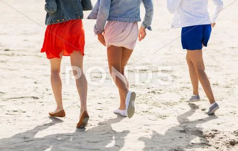 Close up of women legs running on beach Stock Photos