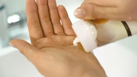 Close up. Women's hands are applied to the skin cream-soap, washing, skin care. 動画素材 124726199