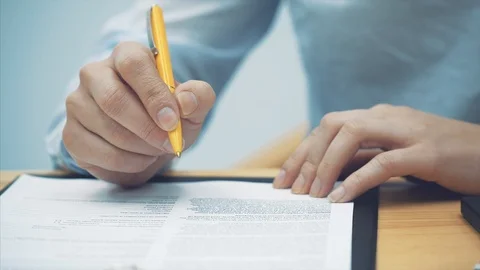 Close-up of women's hands, checking documents. Managing your own small business Stock Footage 104228377
