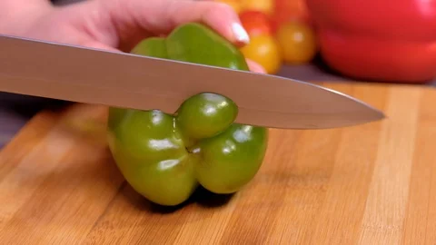 Close up women's hands cut vegetables Stock Footage 123357054