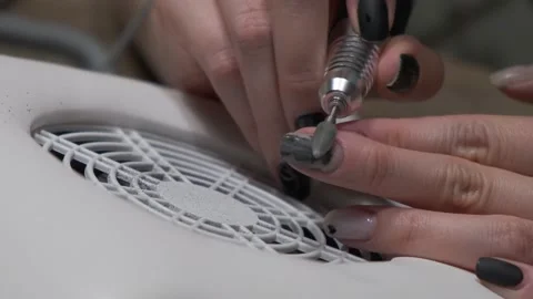 Close-up of women's hands doing hardware manicures at home Stock-Footage 139962166