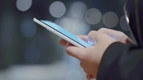 Close up of women's hands holding cell phone. Stock Footage 94370183