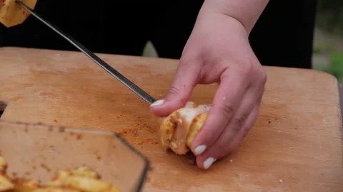 Close-up of women's hands that make kebab with potatoes and lard Video stock 194542524