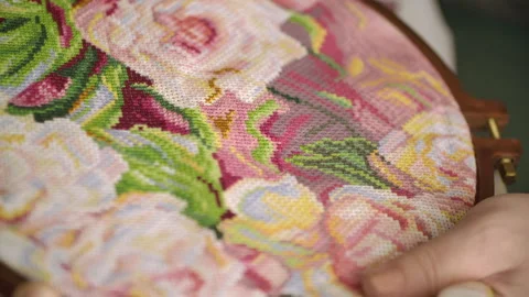 Close-up of women's hands with a needle and thread and frame for embroidery Stock Footage 166902732