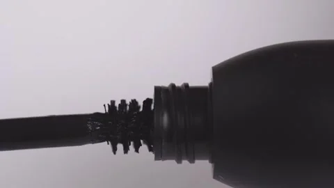 Close-up of women's hands opening and closing mascara. Cosmetics for eyelas.. Stock Footage 259036729