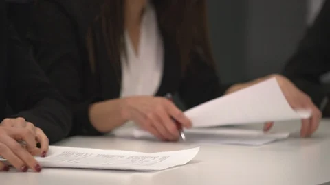 Close up of womens hands signing documents Stock Footage 86664850
