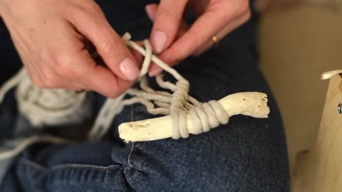 Close up of women's hands weaving macrame in a home workshop.Handmade concept. Stock Footage 154095654