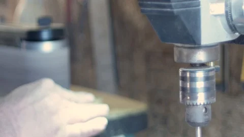 Close up on wood as carpenter uses oscillating sander to shape wood as Video stock 107670441