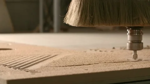 Close up of wood carving machine making pattern on a wooden plank. Creative Stock Footage 220220812