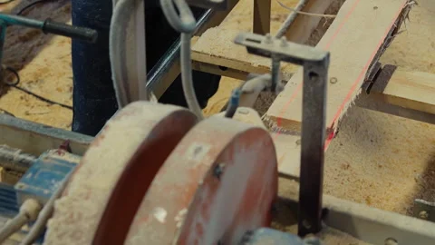 Close Up Of Wood Processing Saw Equipment Cutting Pieces Of Timber Board Stock Footage 241128492