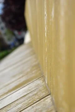 Close up of a wooden bench selective focus 库存照片
