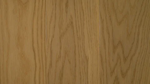 Close-up of wooden floors made of solid boards of light oak in light beige tones Stock Footage 123359874