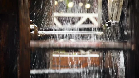 Close up of a wooden water mill in process. Stock Footage 139784351
