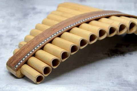 Close-up of woodwind instrument pan flute. Details of musical instruments, mu Stock Photos