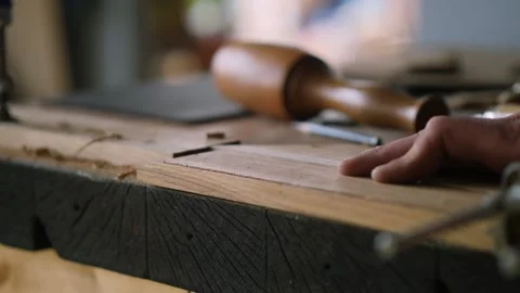 Close up. a woodworker cuts cuts in an oak board with a tongue-and-groove. ca Stock Footage 144244754