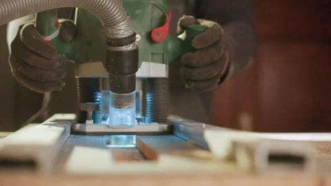 Close up of woodworking precision cutting with power tool and hand held machine Vídeo Stock 347103686