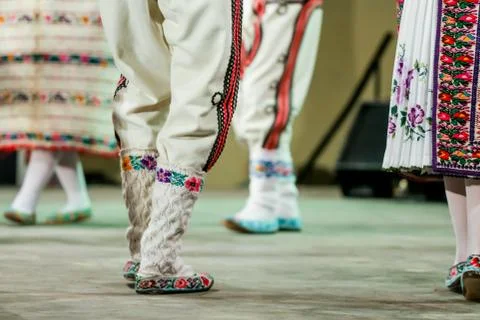 Close up of wool socks on legs of young Romanian dancer in traditional folklo Stock Photos