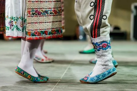 Close up of wool socks on legs of young Romanian female and male dancers in t Stock Photos