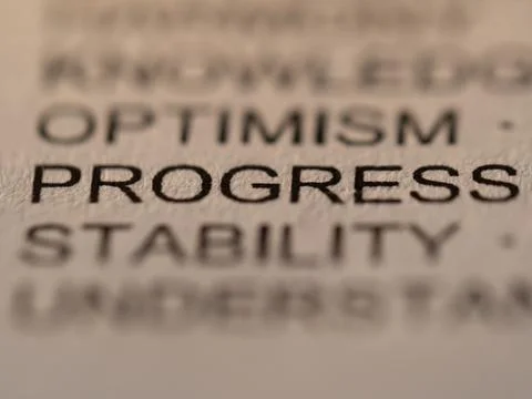 Close-Up Of The Word 'progress' Focused In Printed Text Stock Photos
