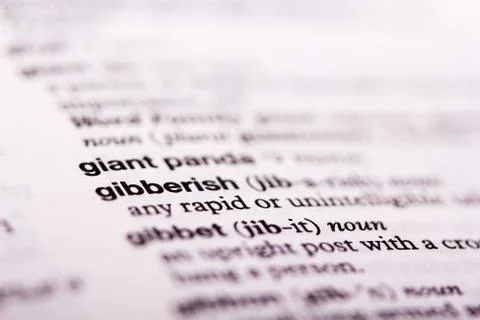 Close up of words in a dictionary Stock Photos