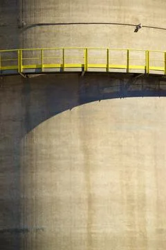 Close-up of a work platform in the concrete storage tanks of a cement factory 스톡 사진