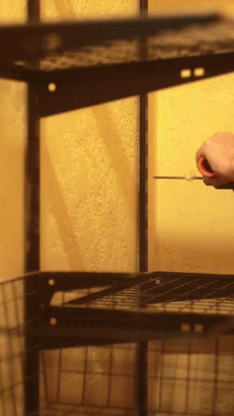 Close-up of a worker drilling a hole in a wall with a power tool during she.. Stock Footage 341673142