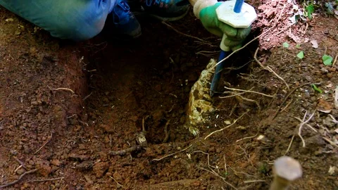 Close up of a worker drilling rocks with a hammer and a driller. Stock Footage 109247715