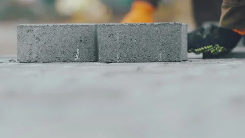Close-Up, Worker With Gloves Setting Paving Slabs 库存影片 148786970