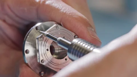 Close up on worker hands during metal part finishing process Stock Footage 132512103