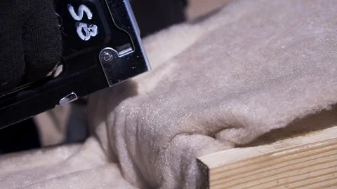 Close up for worker hands in protective glass stitching thermal insulation Stock Footage 116079136