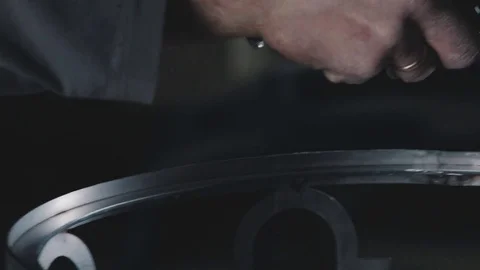 Close-up: the worker makes a decorative metal element Stock-Footage 74692517