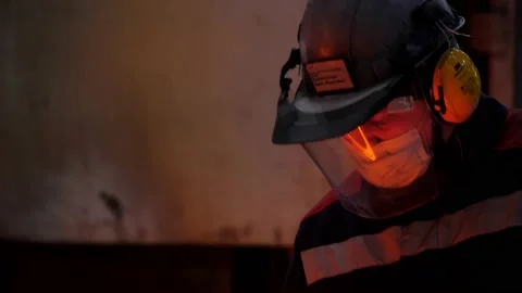 Close-up of a worker making a hot metal part. Stock Footage 148098365