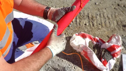 Close up of a worker preparing explosives for mining Stock Footage 232582598